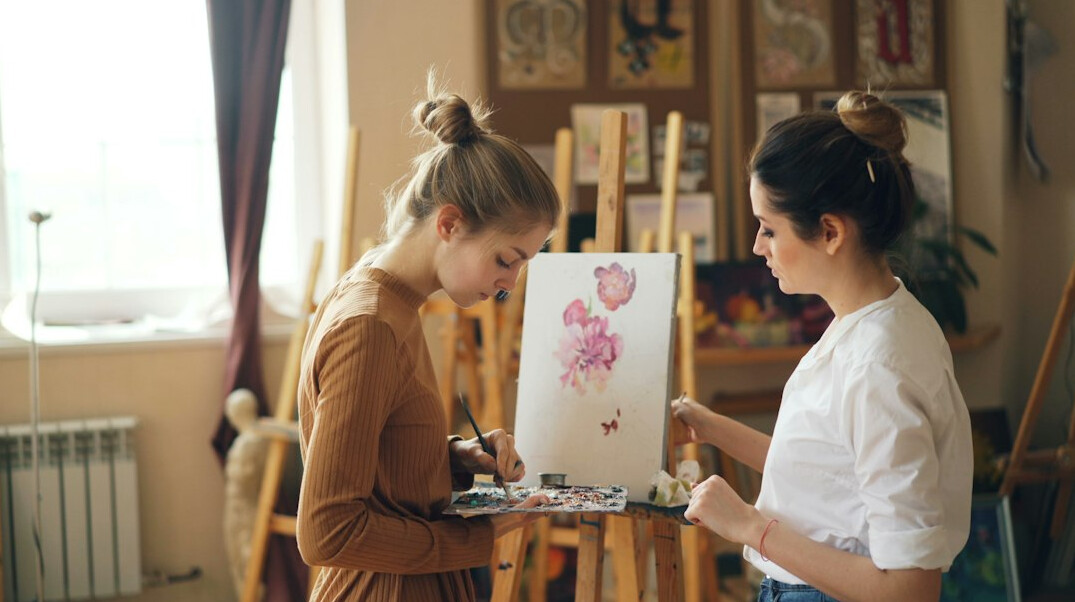 Seniors painting and creating art together in a workshop