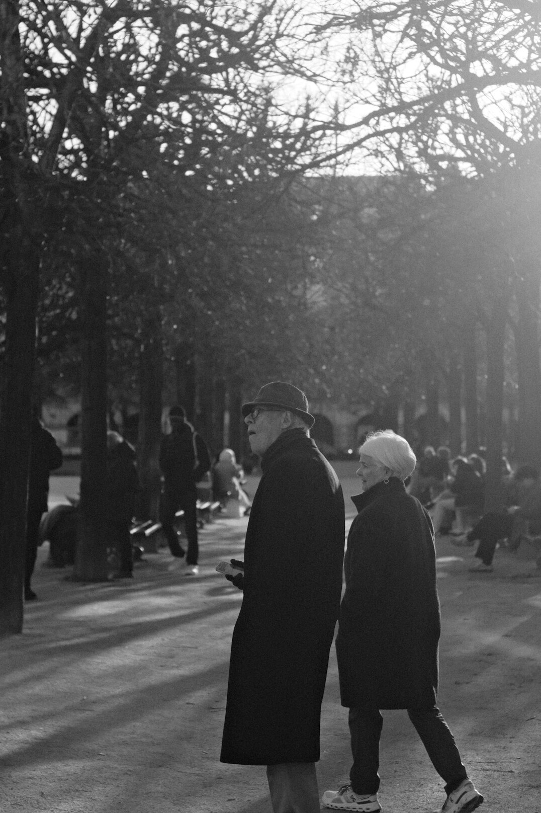 senior couple walking in park